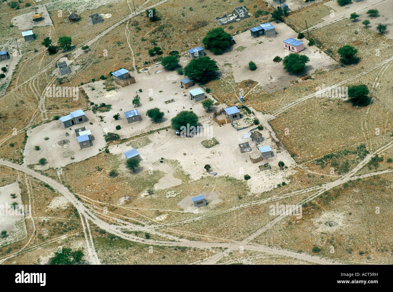 Aerial view of houses and vehicle tracks in Maun Botswana Stock Photo