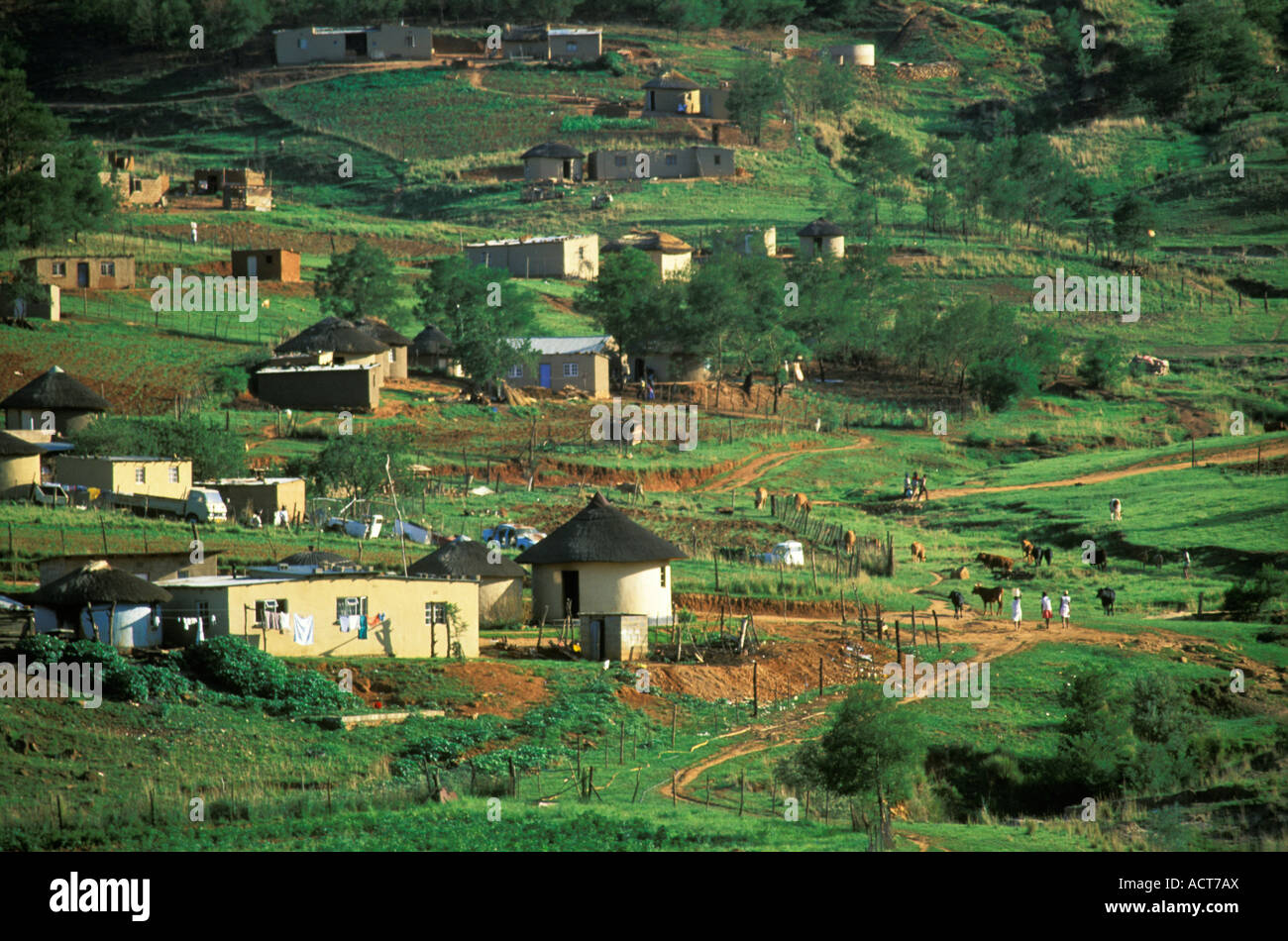 Informal settlement in mountainous rural area with semi traditional and modern homesteads Lesotho Stock Photo