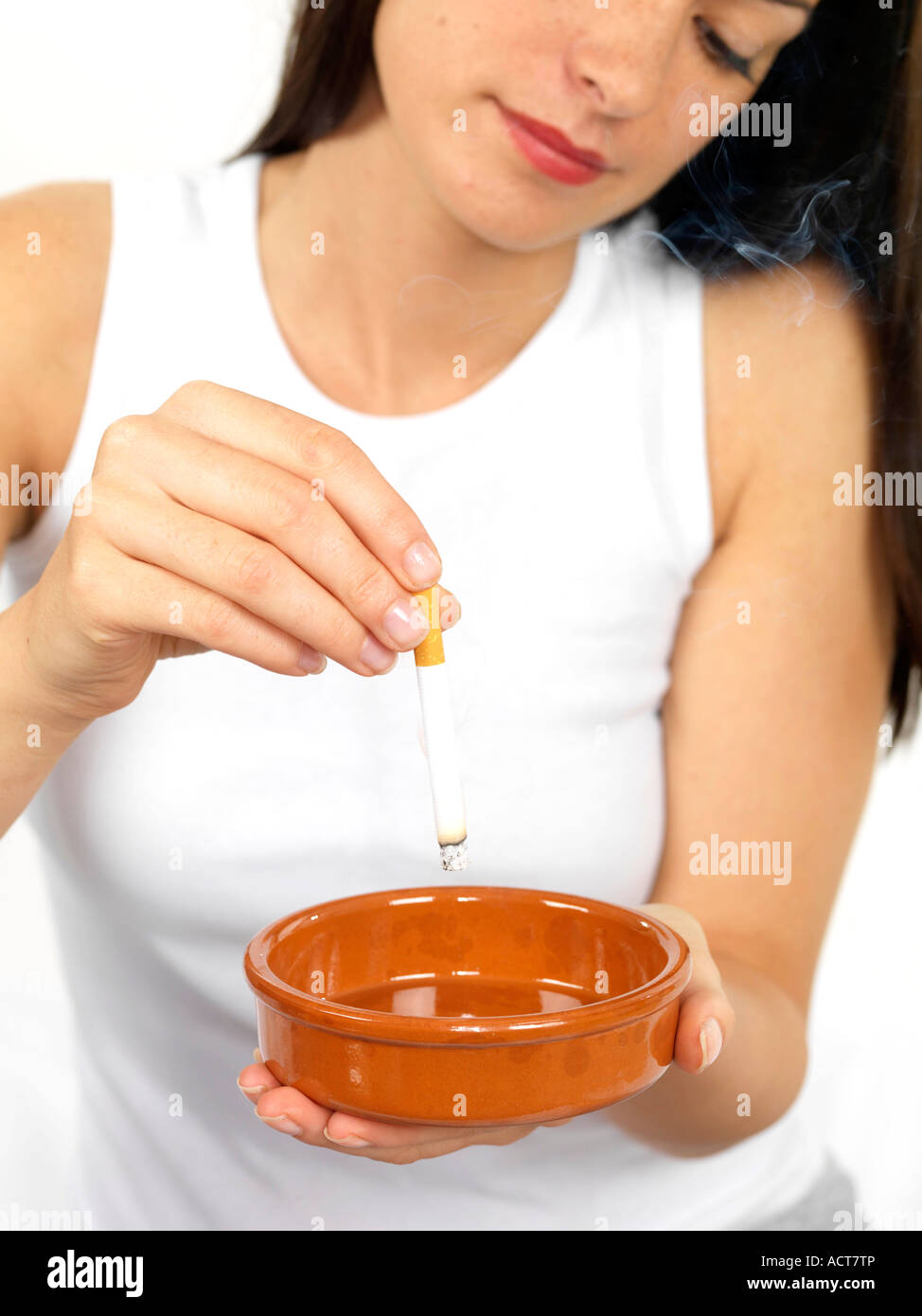 Young Woman Stubbing Cigarette Out Model Released Stock Photo