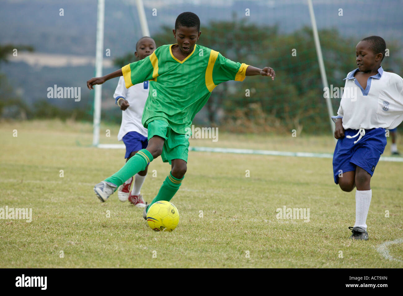 School children eleven year olds playing soccer during a schools soccer festival Nelspruit Mpumalanga South Africa Stock Photo
