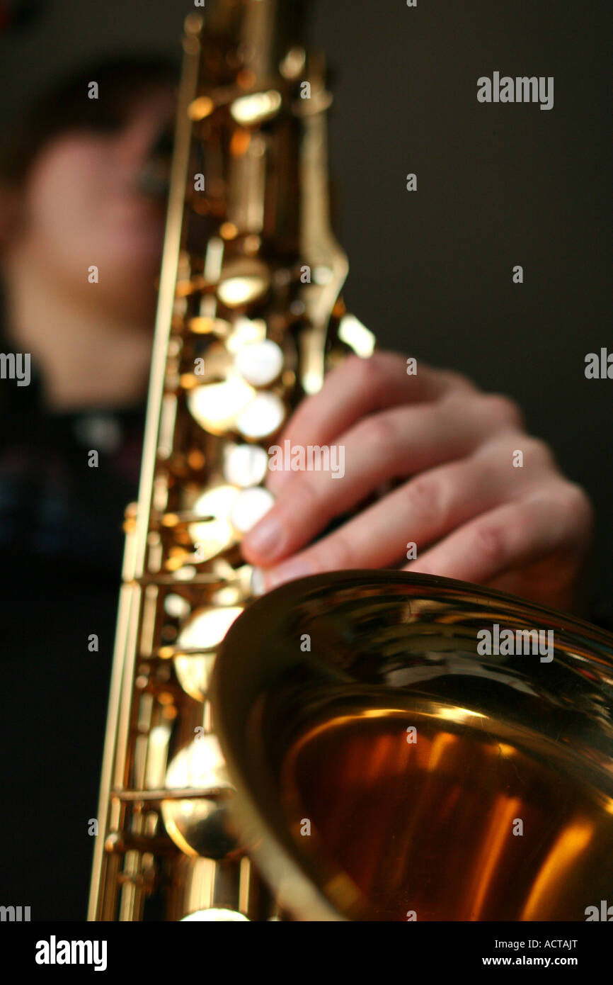 Girl playing Saxophone Stock Photo