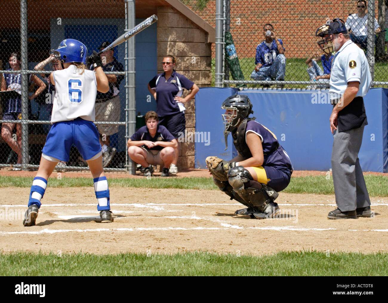 Batter, catcher and umpire wait for the pitch Stock Photo