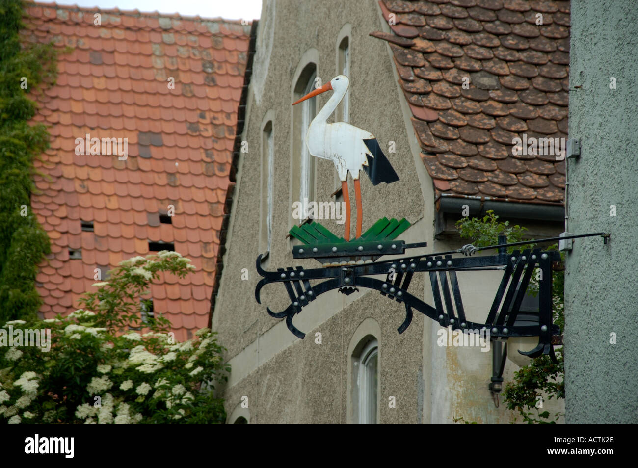 Iron made restaurant sign with a stork Ingolstadt Bavaria Germany Stock Photo