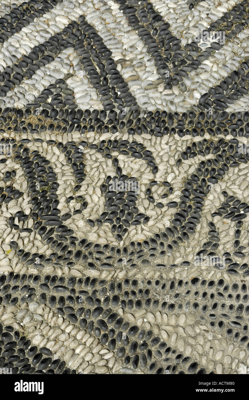 Kochlaki floor of black and white pebble stones in the Monastery Panormitis Island of Symi Greece Stock Photo