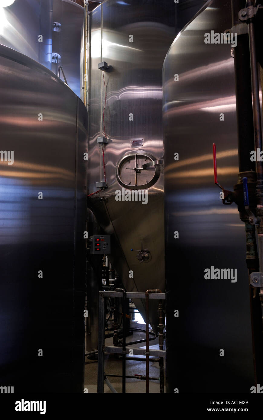 Stainless steel fermenting vats in the Steamwhistle beer micro brewery