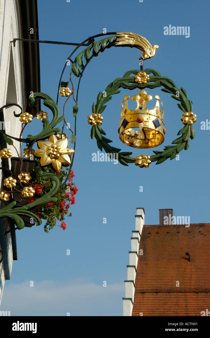 Old iron made and coloured restaurant sign of Gasthof Krone showing a gilded crown in the city center Beilngries Altmuehltal Stock Photo