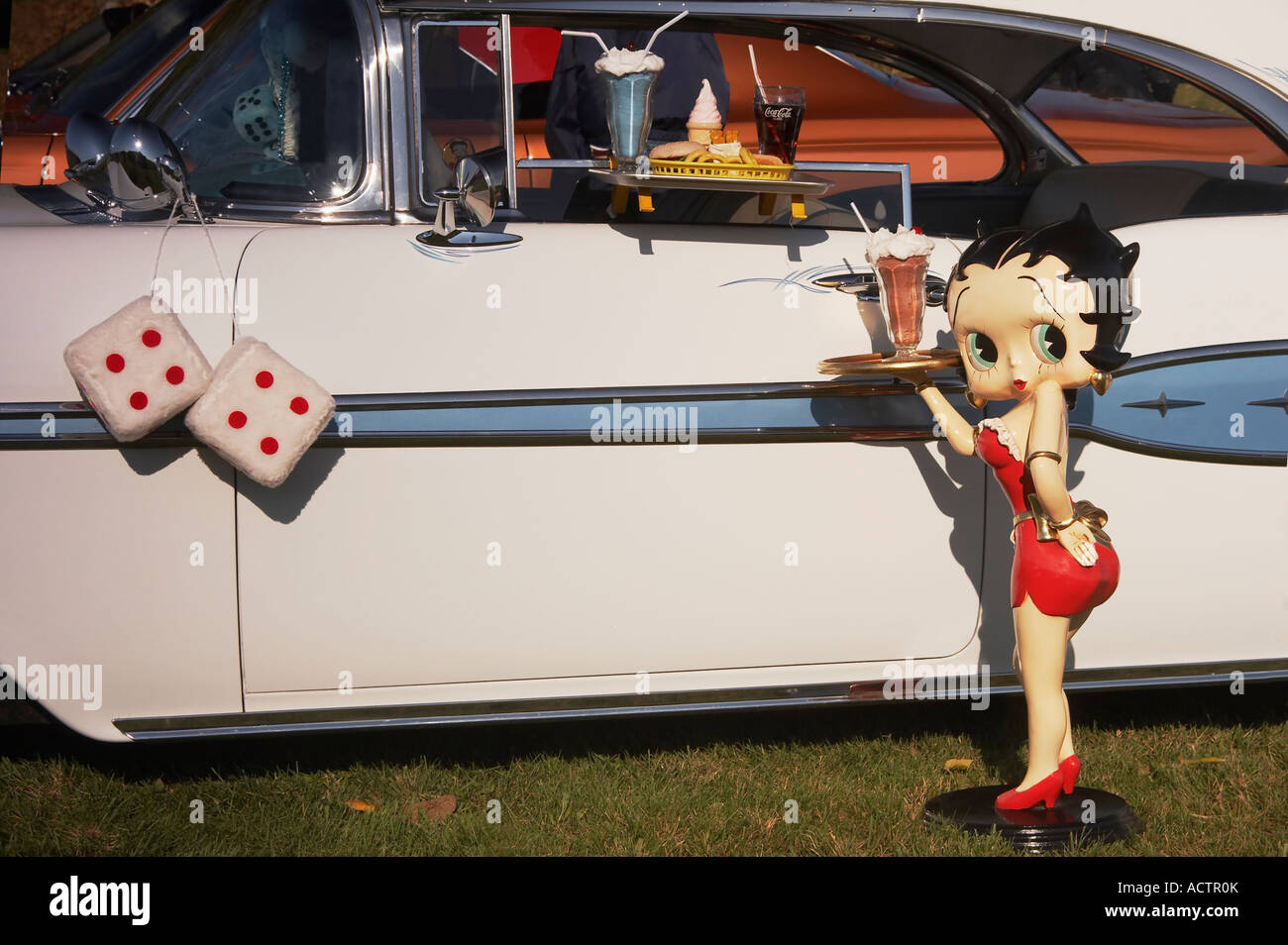 Betty Boop 1950s antique car and fluffy dice Stock Photo