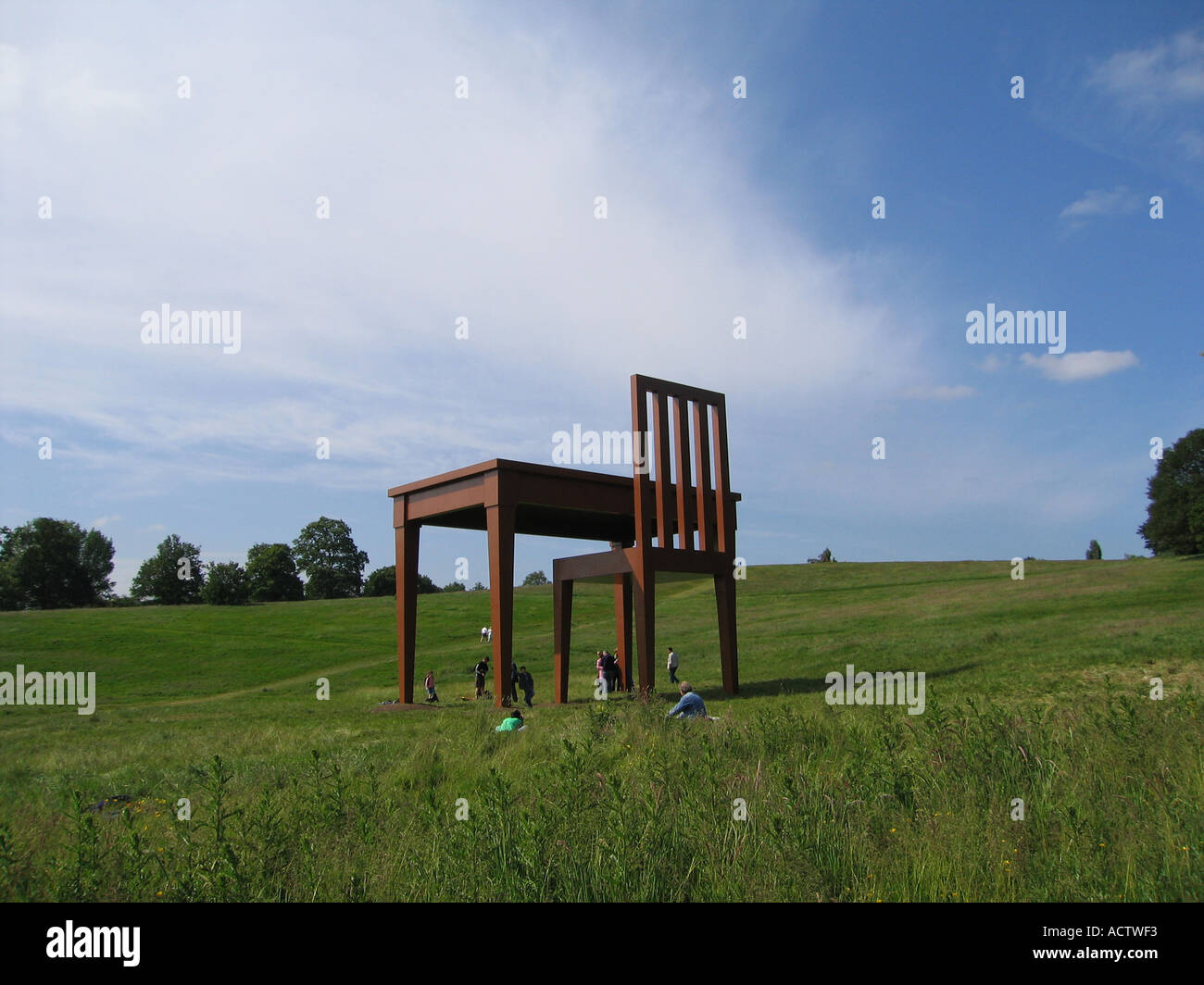 Huge table and chair sculpture on Hampstead Heath London UK Stock Photo