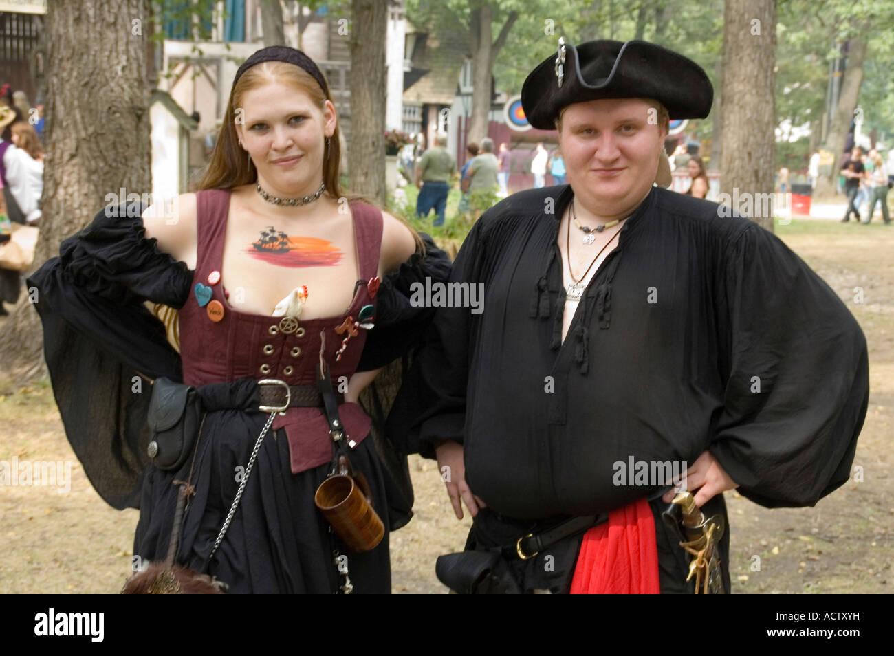 A MAN AND A WOMAN DRESSED UP AS OLD EUROPEAN COUPLE AT RENAISSANCE FAIR IN BRISTOL, WISCONSIN Stock Photo