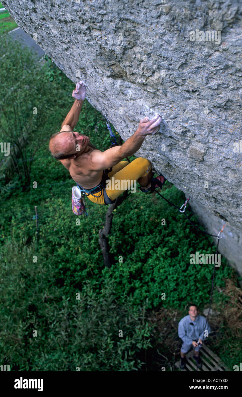 MR Sport climber climbing the extremely difficult route Primeur deluxe ...