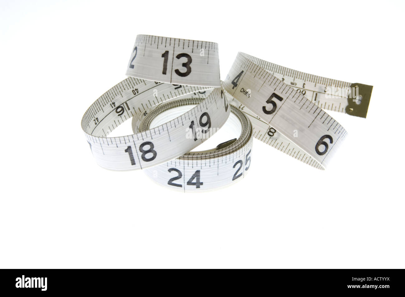 A measuring tape on a white background Stock Photo