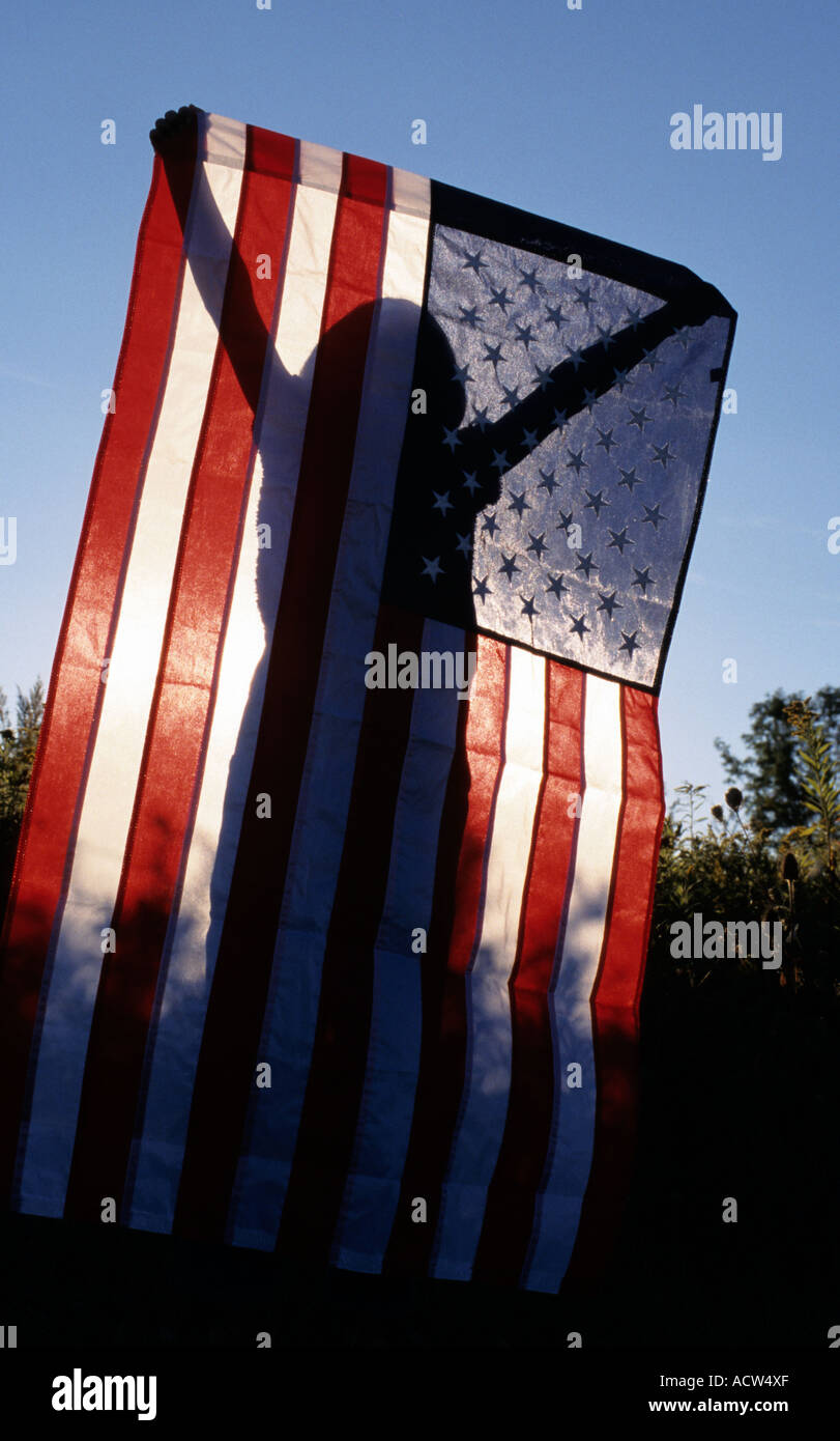 Little girl holding American flag Stock Photo - Alamy