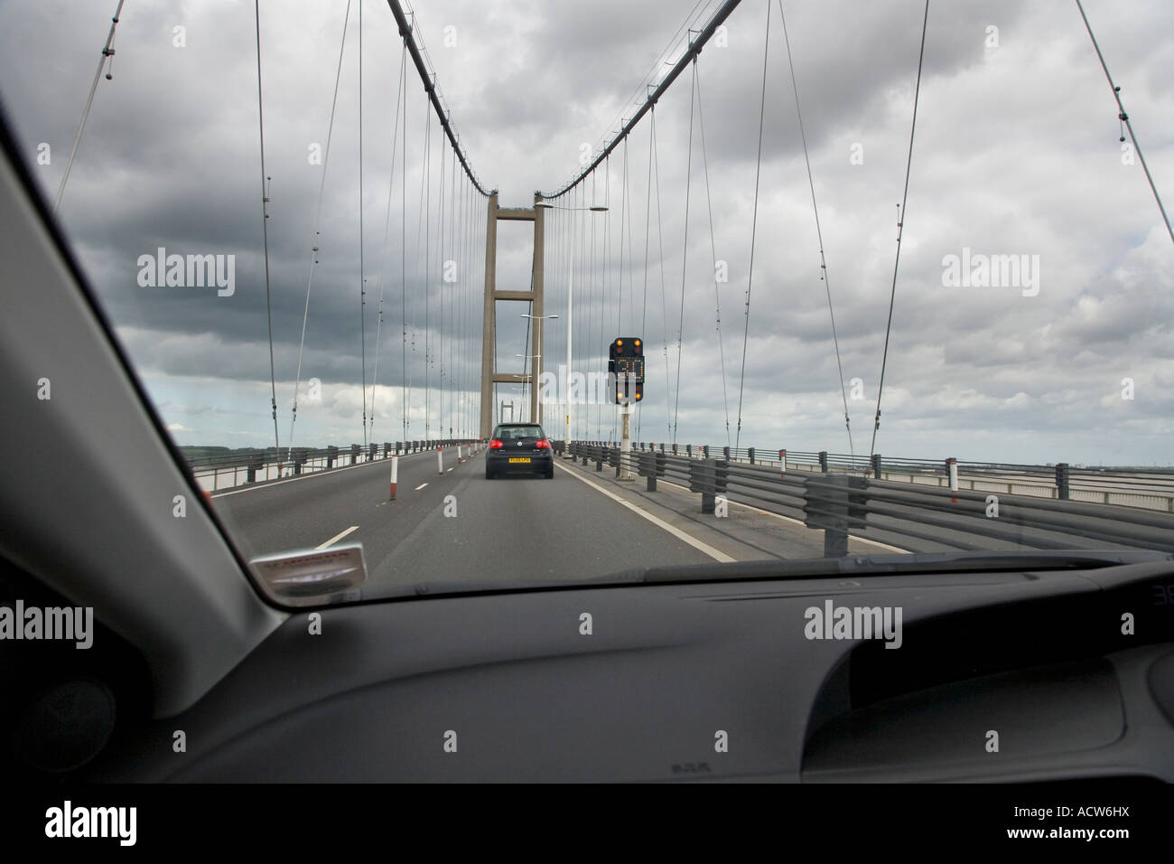THE VIEW FROM INSIDE A CAR WHILE DRIVING ACROSS THE HUMBER SUSPENSION