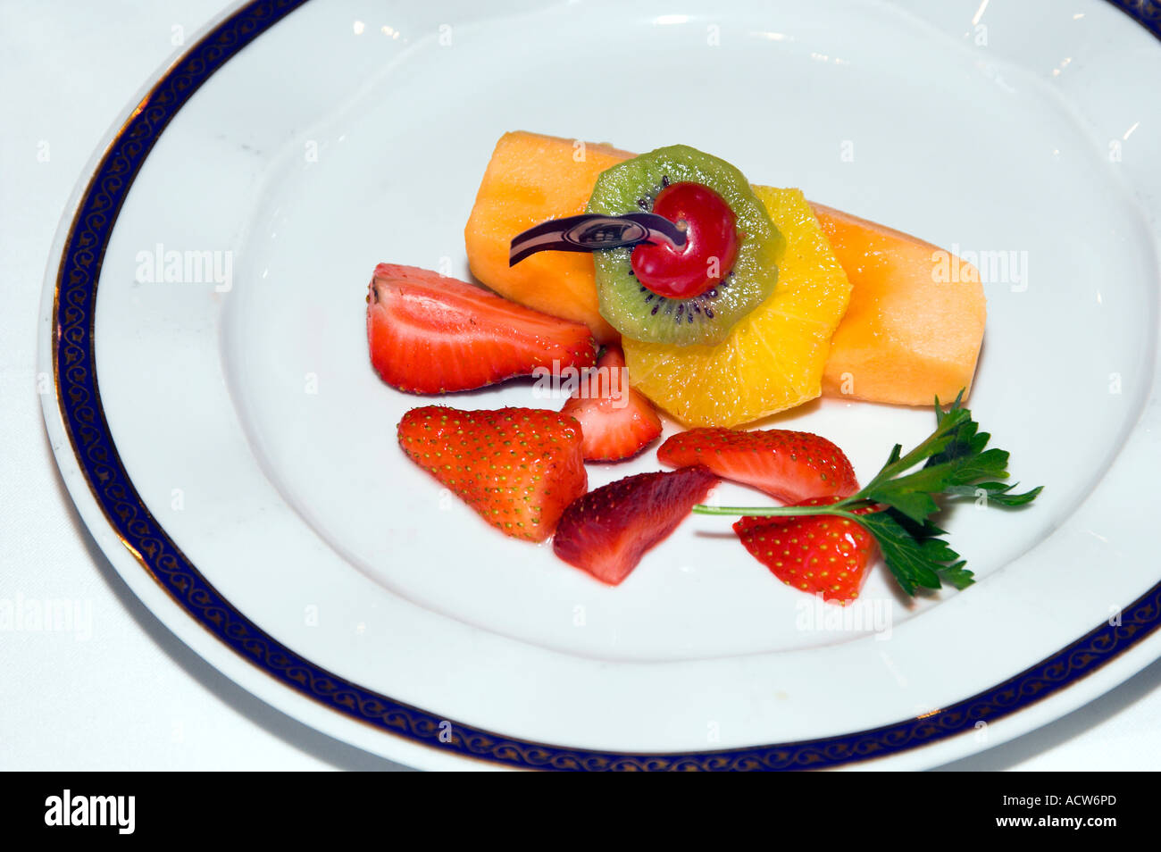 Fresh fruit plate appetizer at the Rotterdam Restaurant on the Holland America cruise ship Zaandam Stock Photo