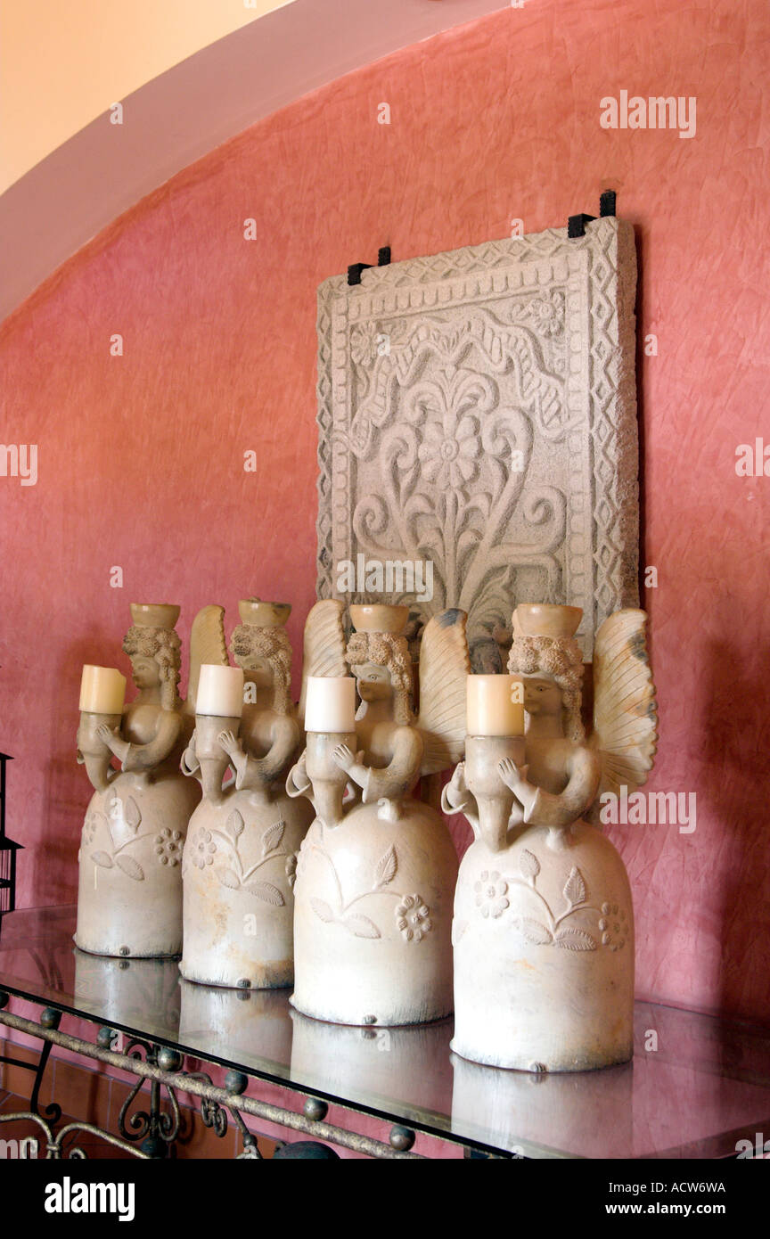 Ornate candle holders and artwork at the Melia Hotel in Colon Panama Stock Photo