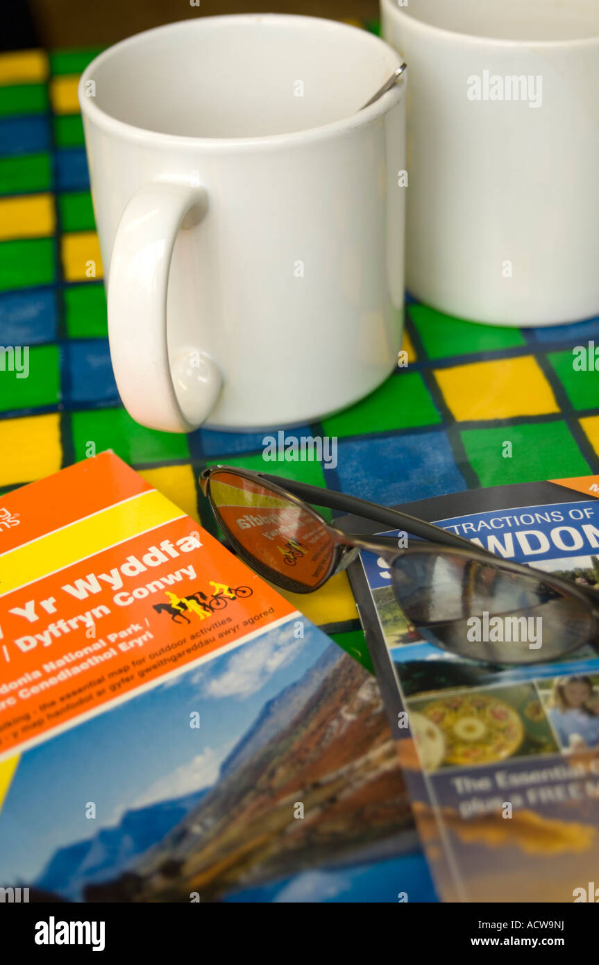 white tea mugs and ordnance survey map Petes Eats Llanberis Gwynedd