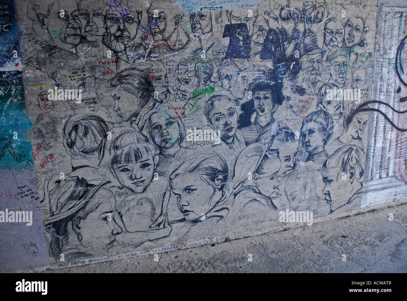 Graffiti on wall . Via dell Amore walkway between Riomaggiore and Manarola , Liguria , Northern Italy , Europe . Stock Photo