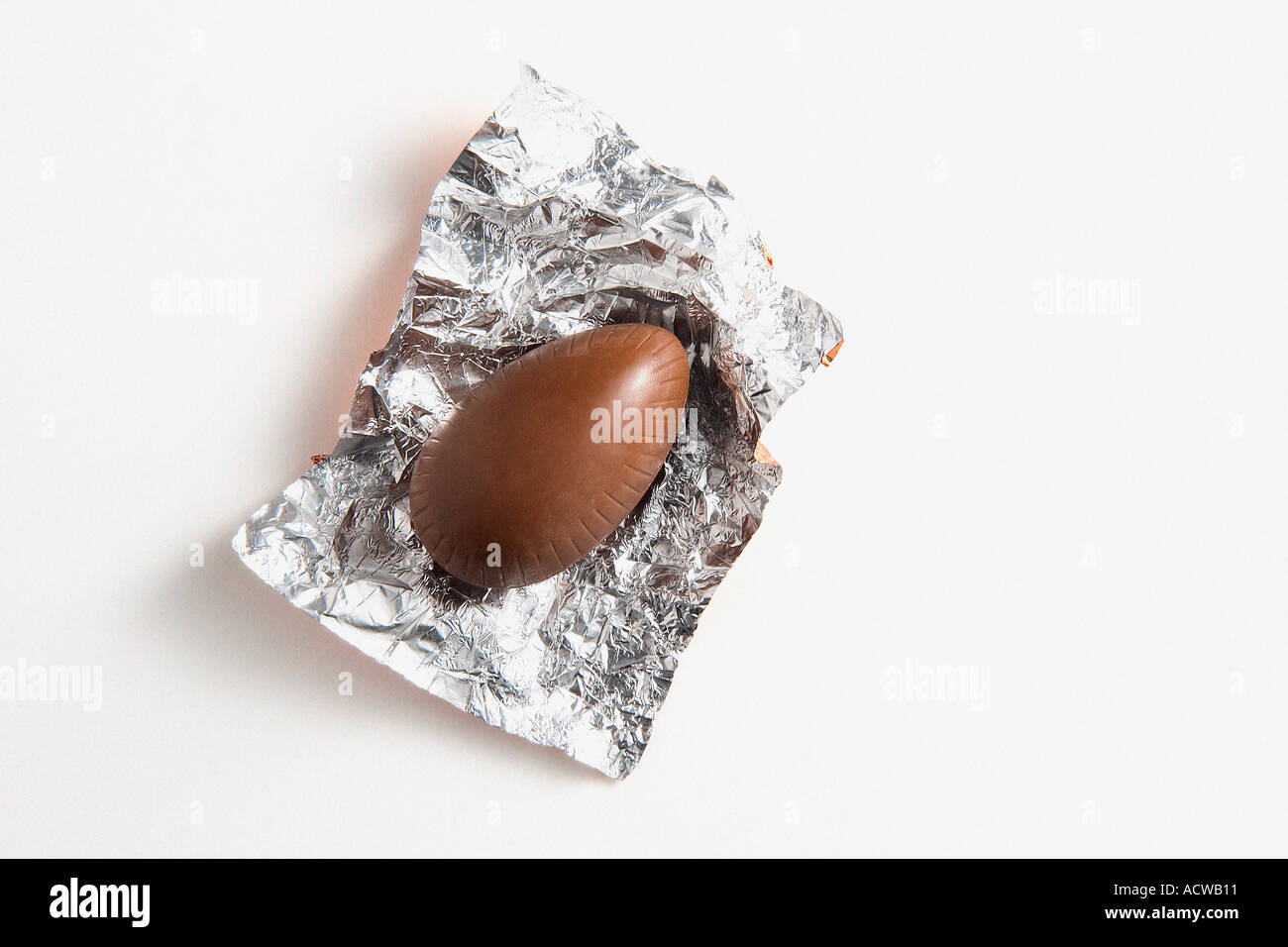 Chocolate in foil wrapper Stock Photo Alamy