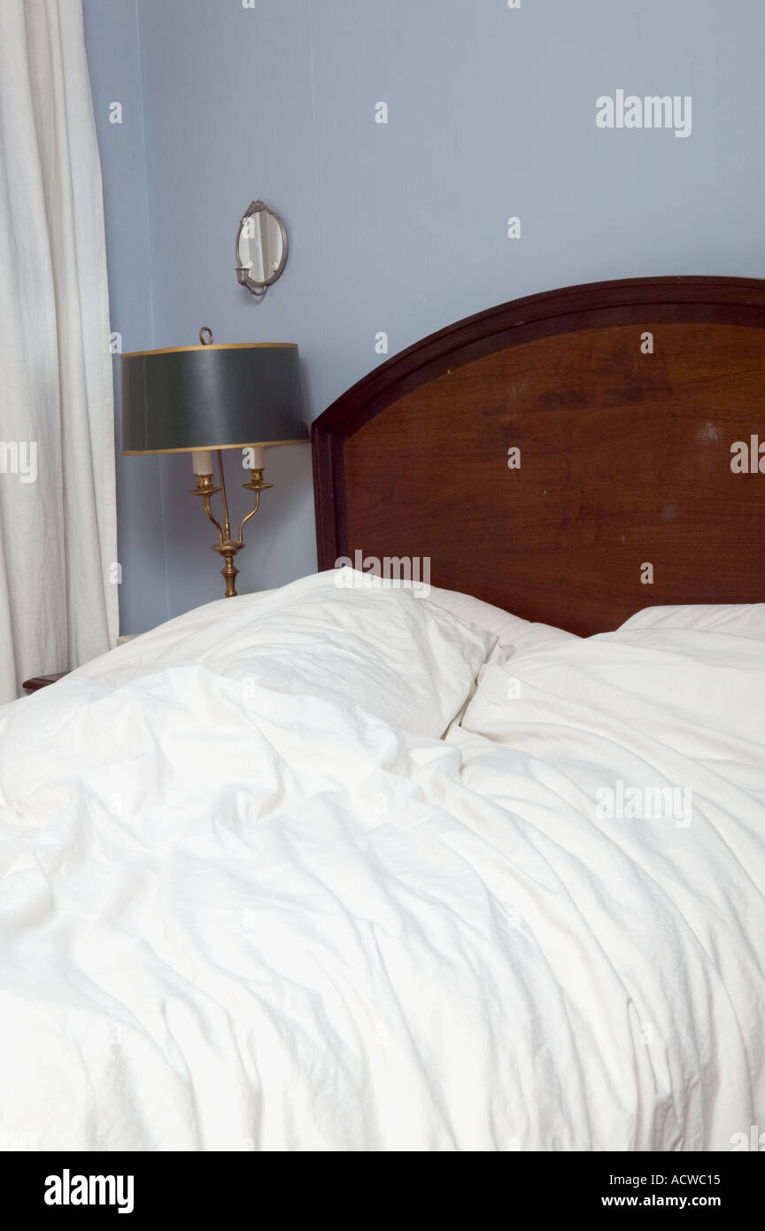 Crumpled sheets on bed Stock Photo Alamy