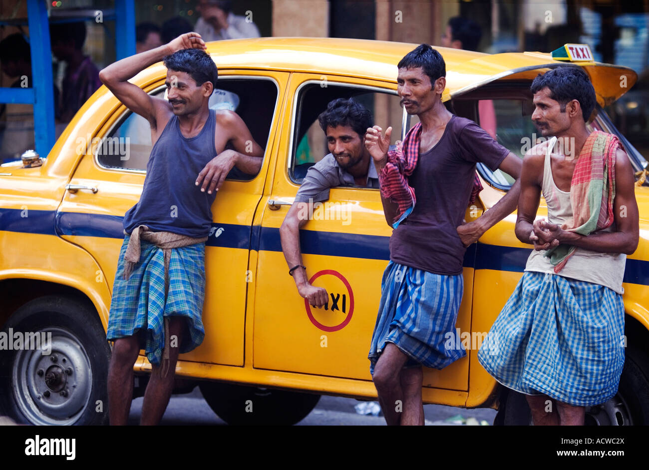 Taxi cab drivers at ease Calcutta Kolkata India Stock Photo Alamy