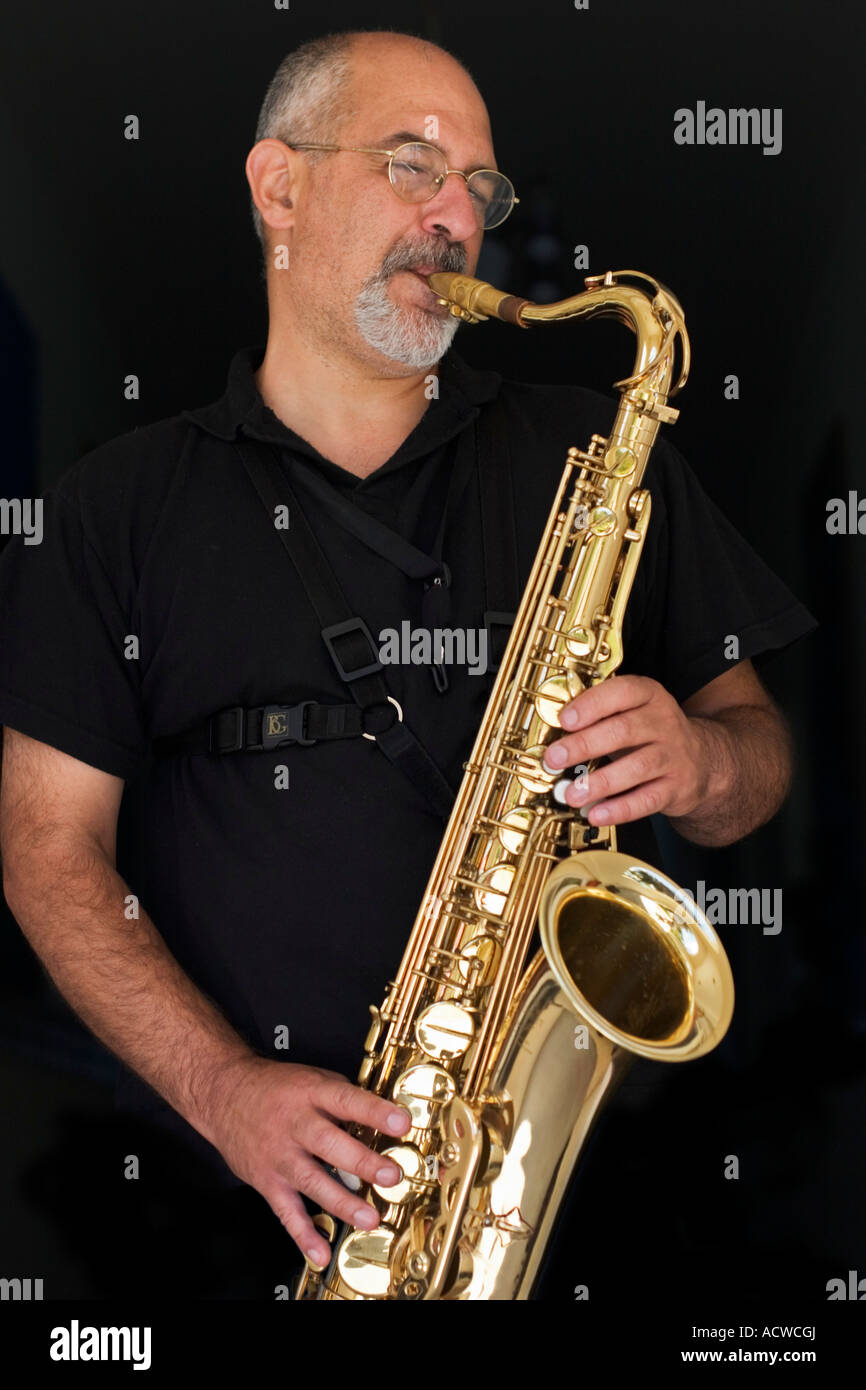 Saxophone player with instrument Stock Photo Alamy
