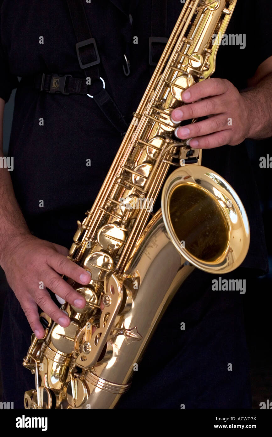 Saxophone brass details with player hands Stock Photo Alamy
