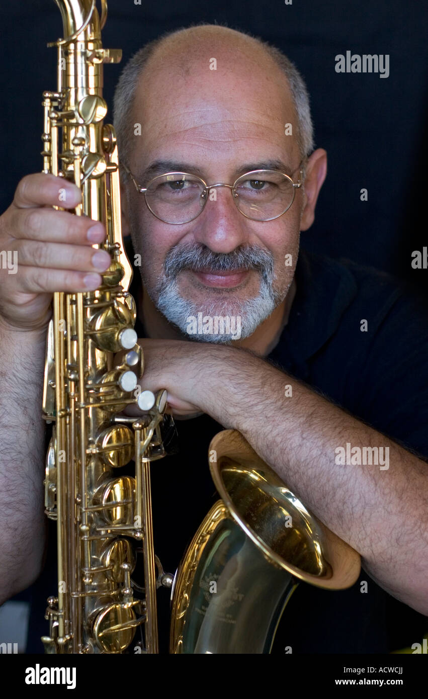 Saxophone player with instrument Stock Photo Alamy
