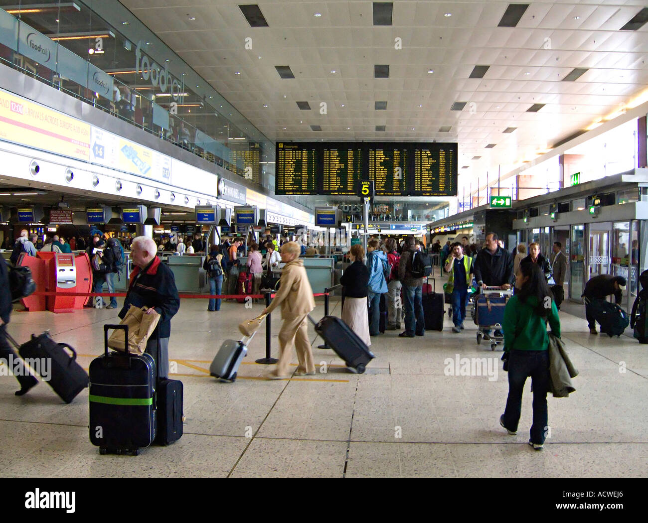 A busy airport departures area - Dublin airport Stock Photo