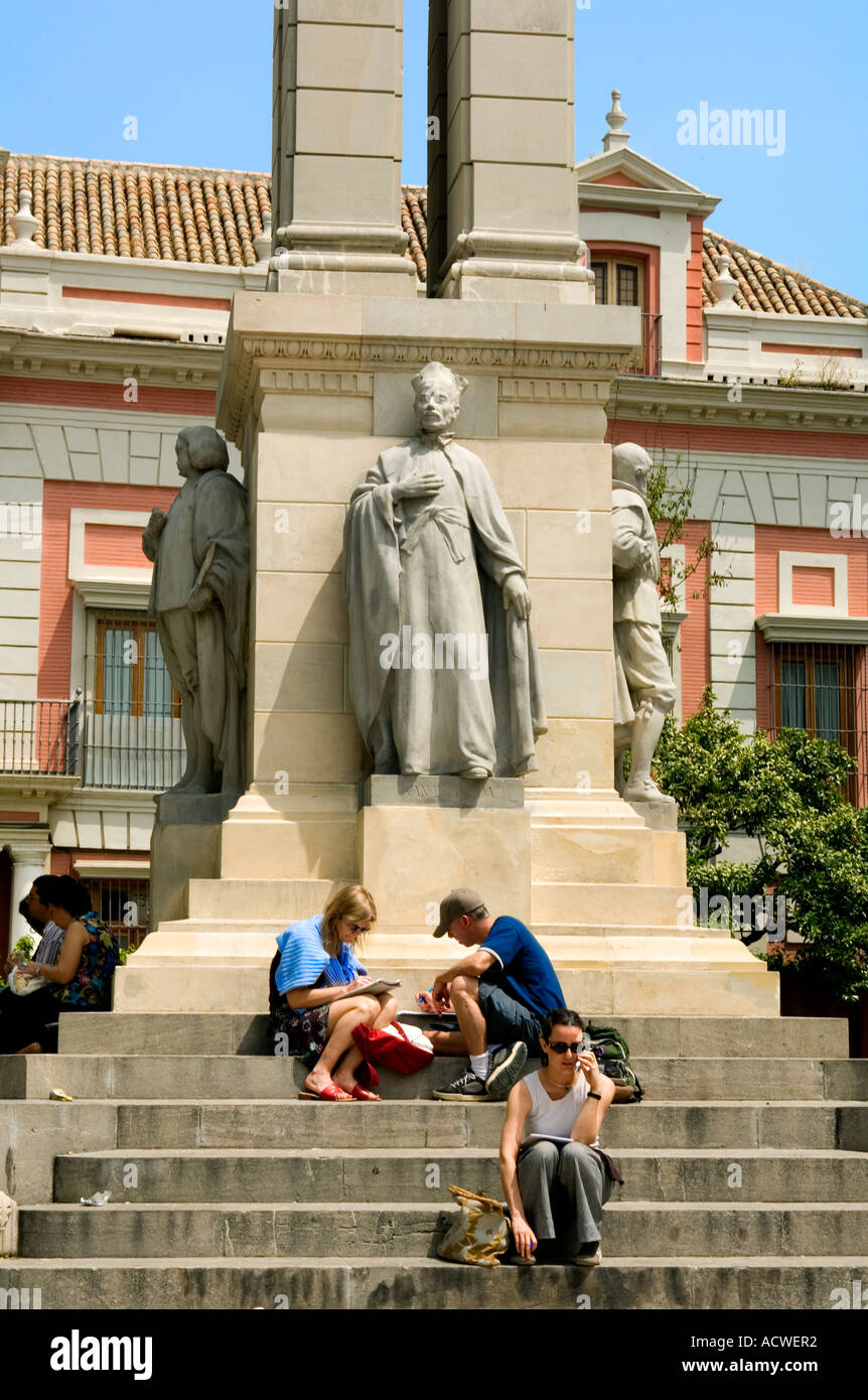 A handy spot for rest and reassessment for tourists outside the bishops palace next to the cathedral in Seville, Andalusia, Spai Stock Photo