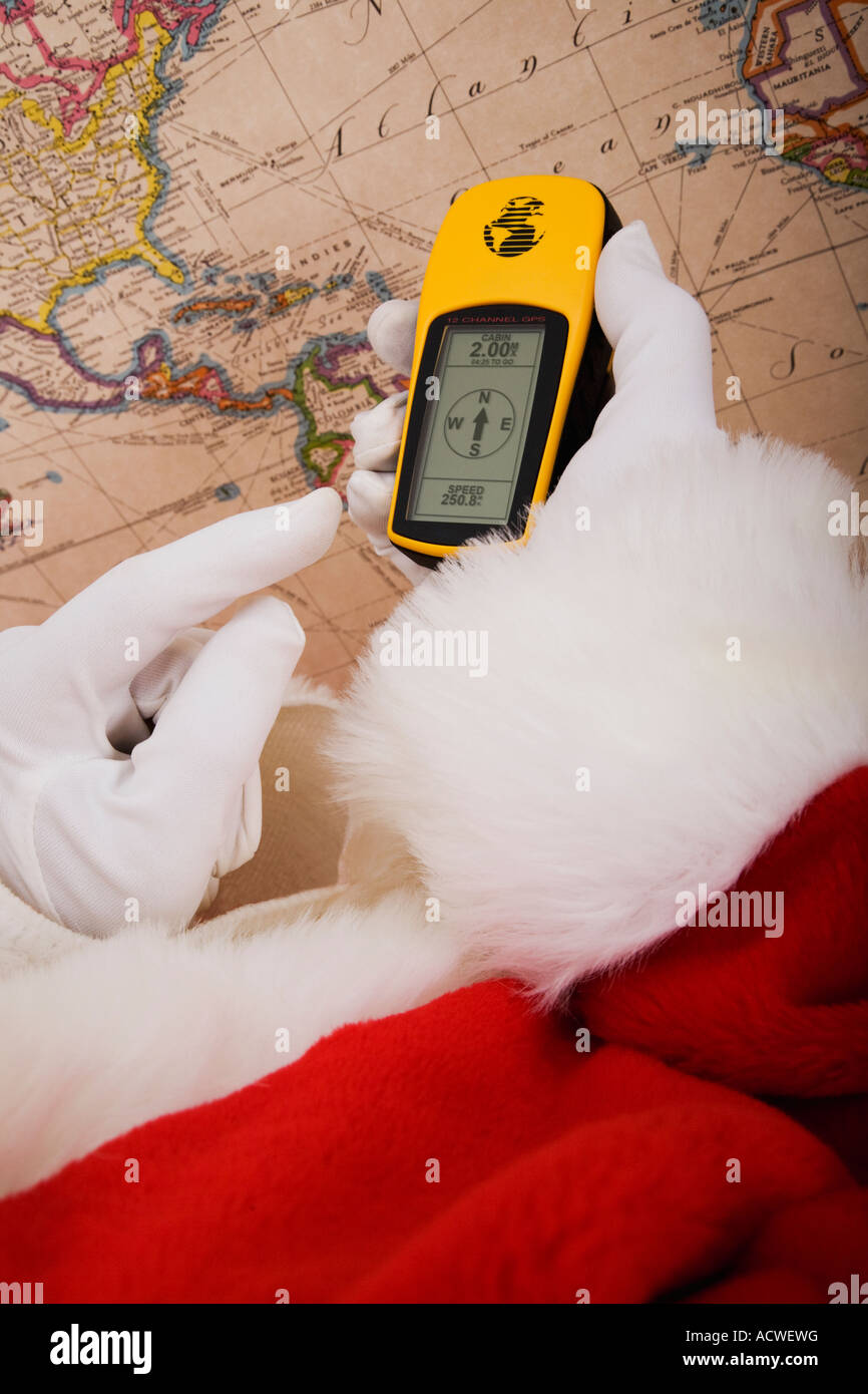 Santa using GPS unit Stock Photo - Alamy