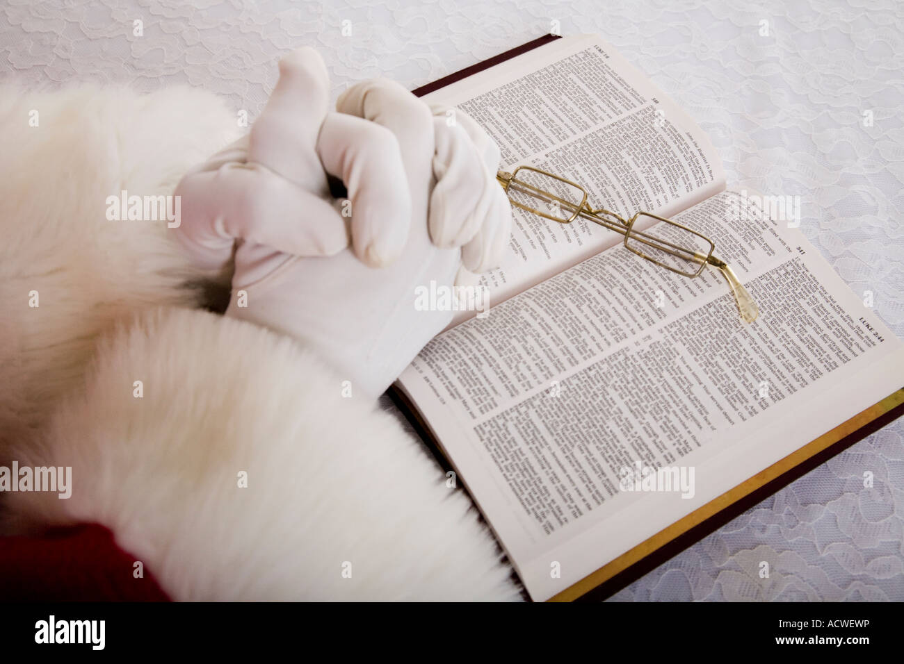 Santa reading Bible Stock Photo Alamy