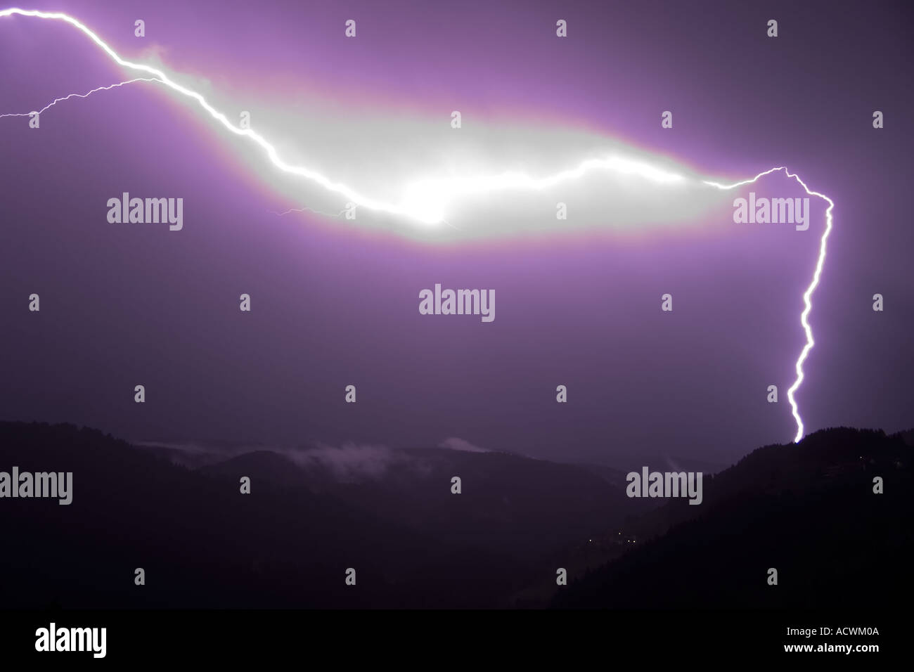 lampo Lightning storm over folgaria trentino climate change Stock Photo