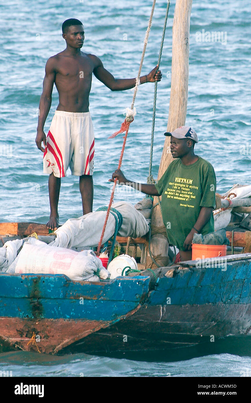 african fishermen working on an old dhau Stock Photo - Alamy