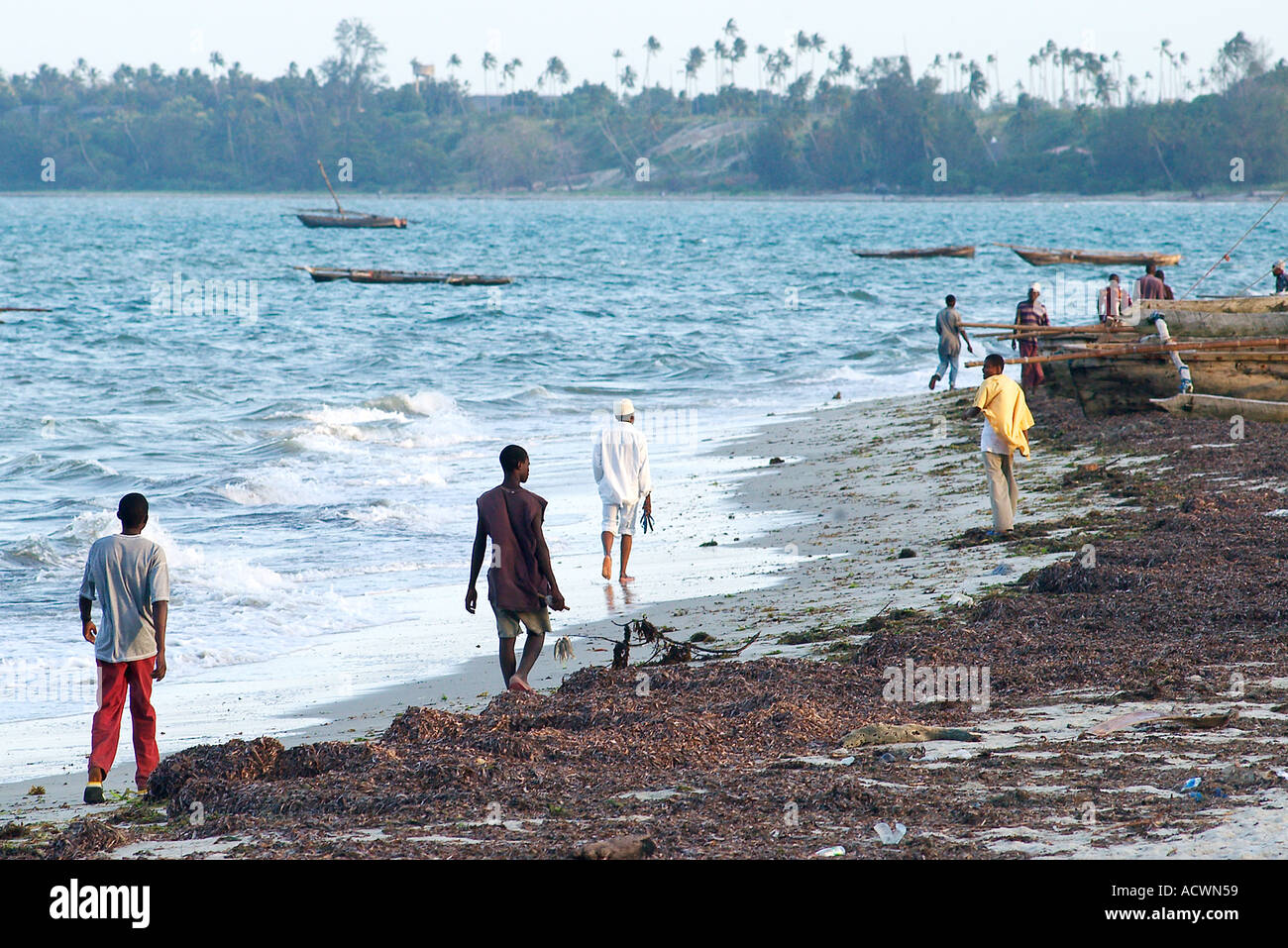 African man walking on beach hi-res stock photography and images - Alamy