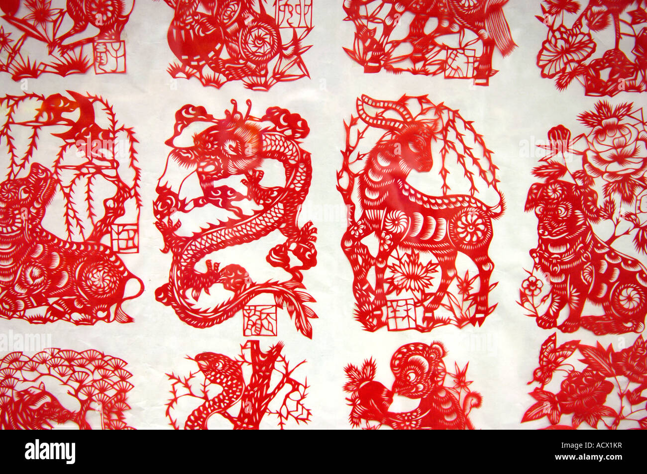 Examples of the ancient art of Chinese paper cutting on sale by the Bell Tower in Xian Stock Photo