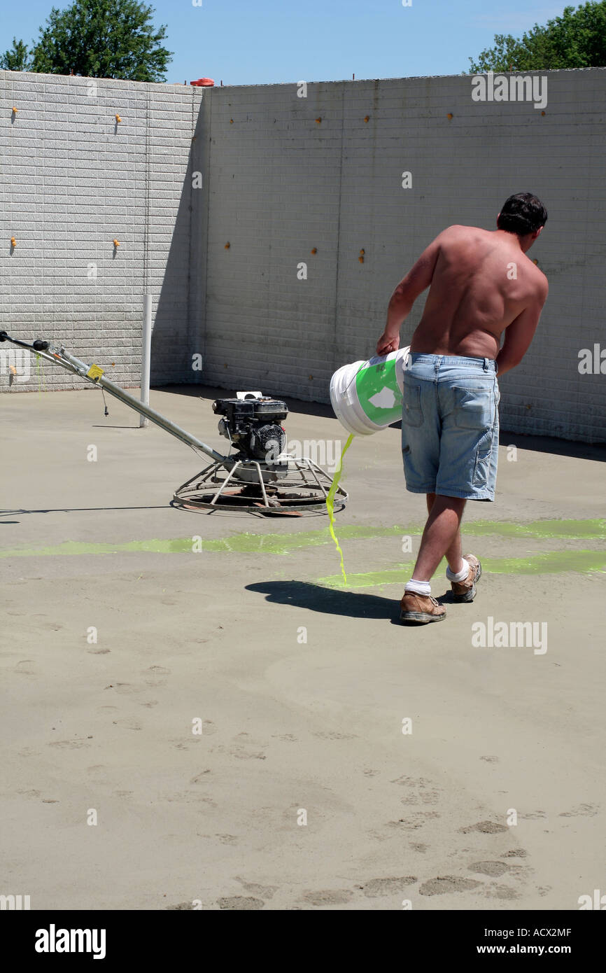 Cement power troweling Stock Photo Alamy