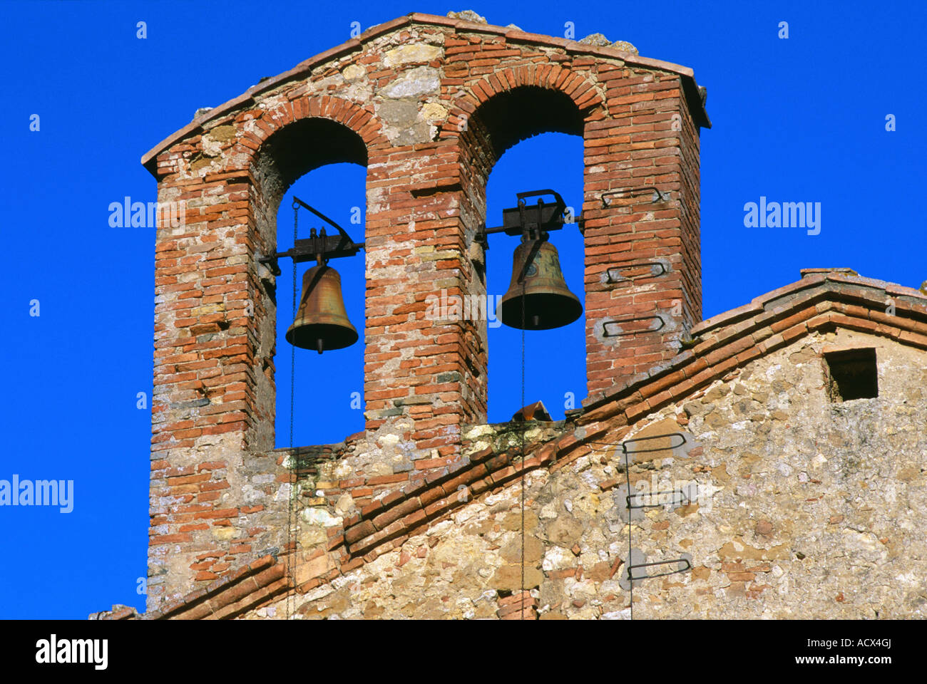 Two bells in brick tower Gaiole in Chianti Tuscany Italy Stock Photo