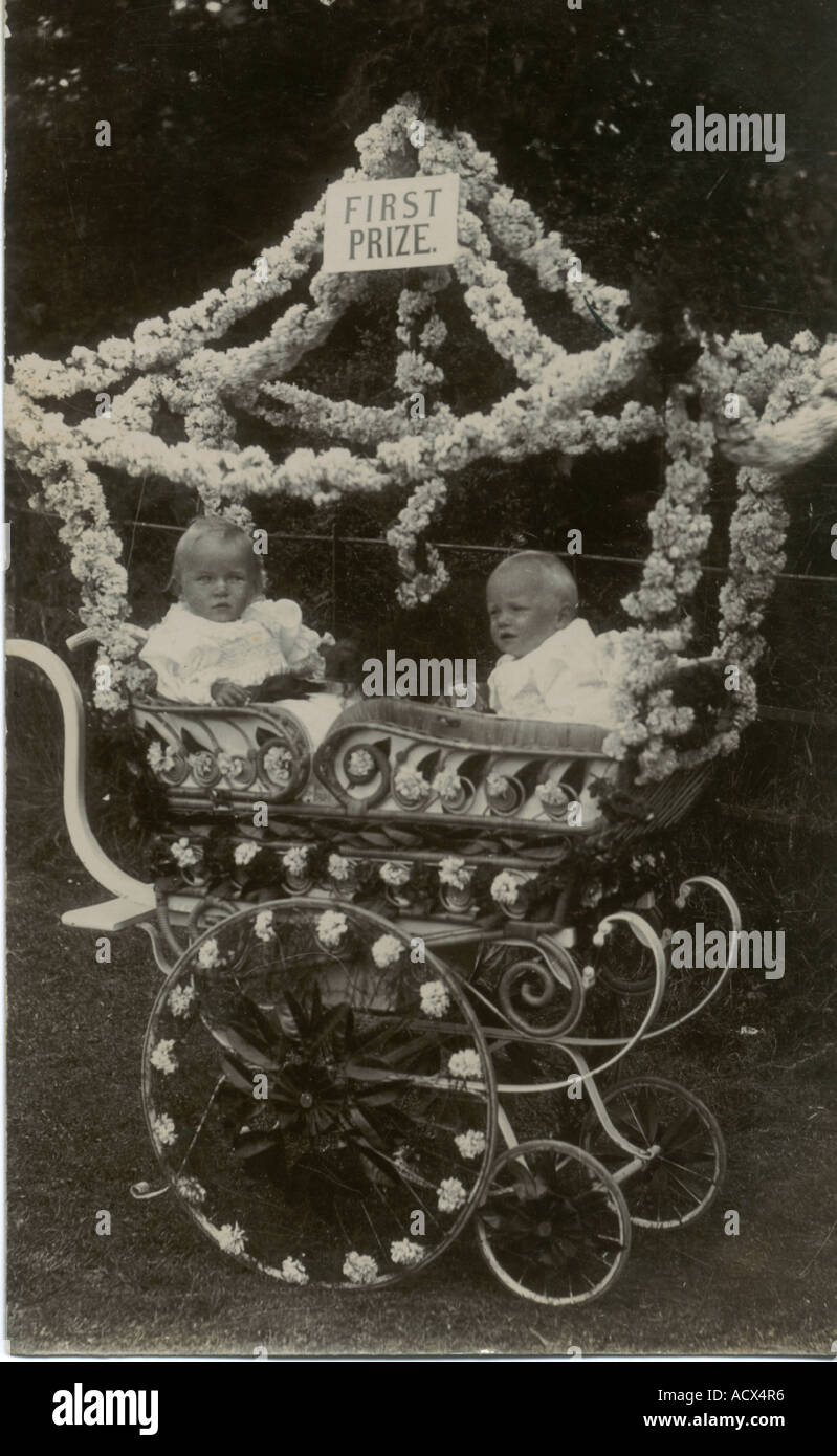Photographic postcard of decorated pram in baby show circa 1895 Stock Photo