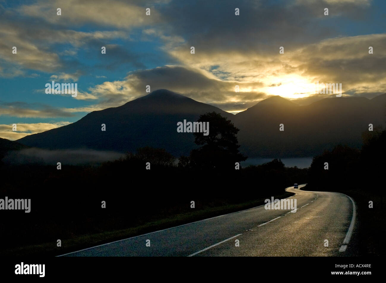 Sun rising over the mountains of Ben More and Stob Binnein, from Strath