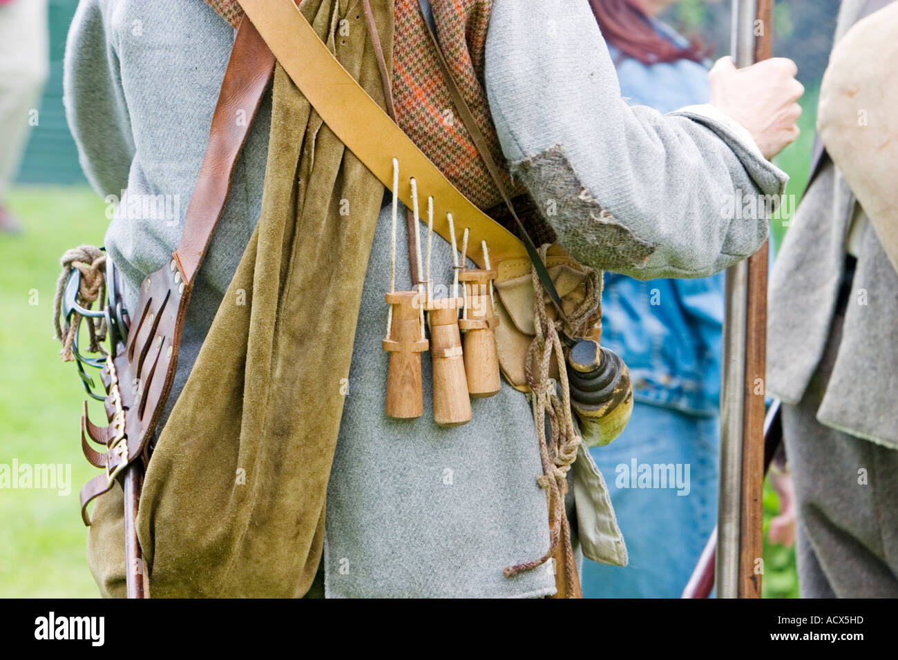Wooden gunpowder pouches hanging on leather bandolier Stock Photo Alamy