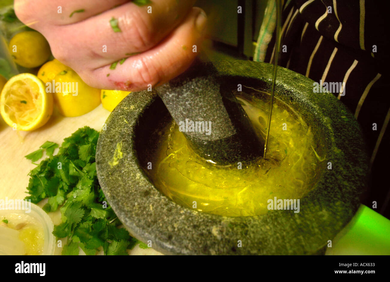 MAKING A SALAD DRESSING AT THE KINGS ARMS AT STOW ON THE WOLD GLOUCESTERSHIRE UK Stock Photo