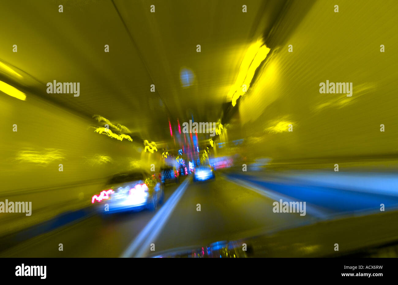 Cars In Traffic Through Tunnel With Motion Blur Stock Photo