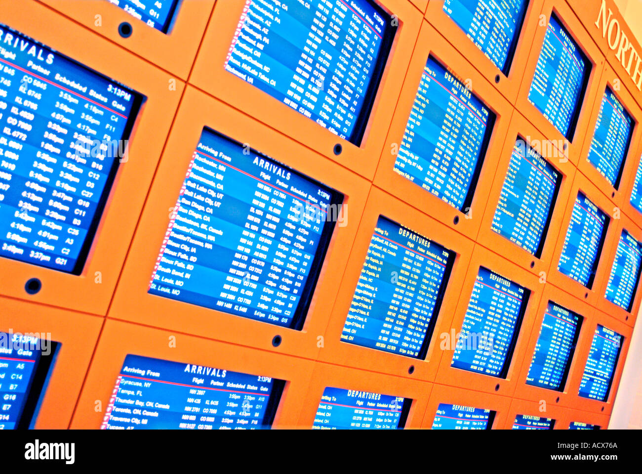 Multiple CRT TV monitors at airport Stock Photo