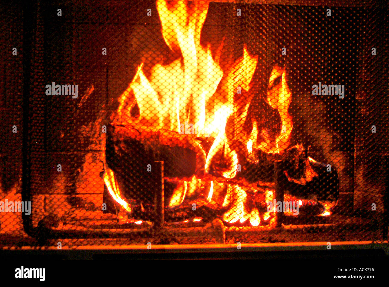 Wood logs burning in fireplace Stock Photo Alamy
