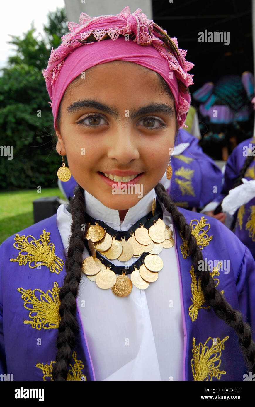PORTRAIT OF TURKISH TEENAGER GIRL IN FOLKLORISTIC DRESS DURING UK TURKISH FESTIVAL IN SOUTHBANK