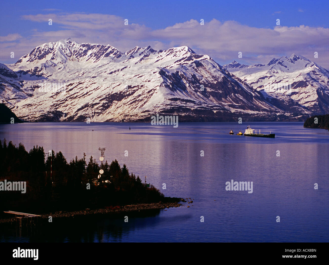 An oil tanker sailing out of Valdez Narrows with oil from the North