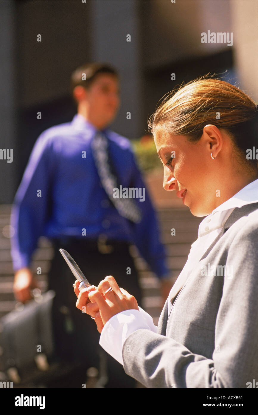 Businesswoman with cellphone in Los Angeles Stock Photo
