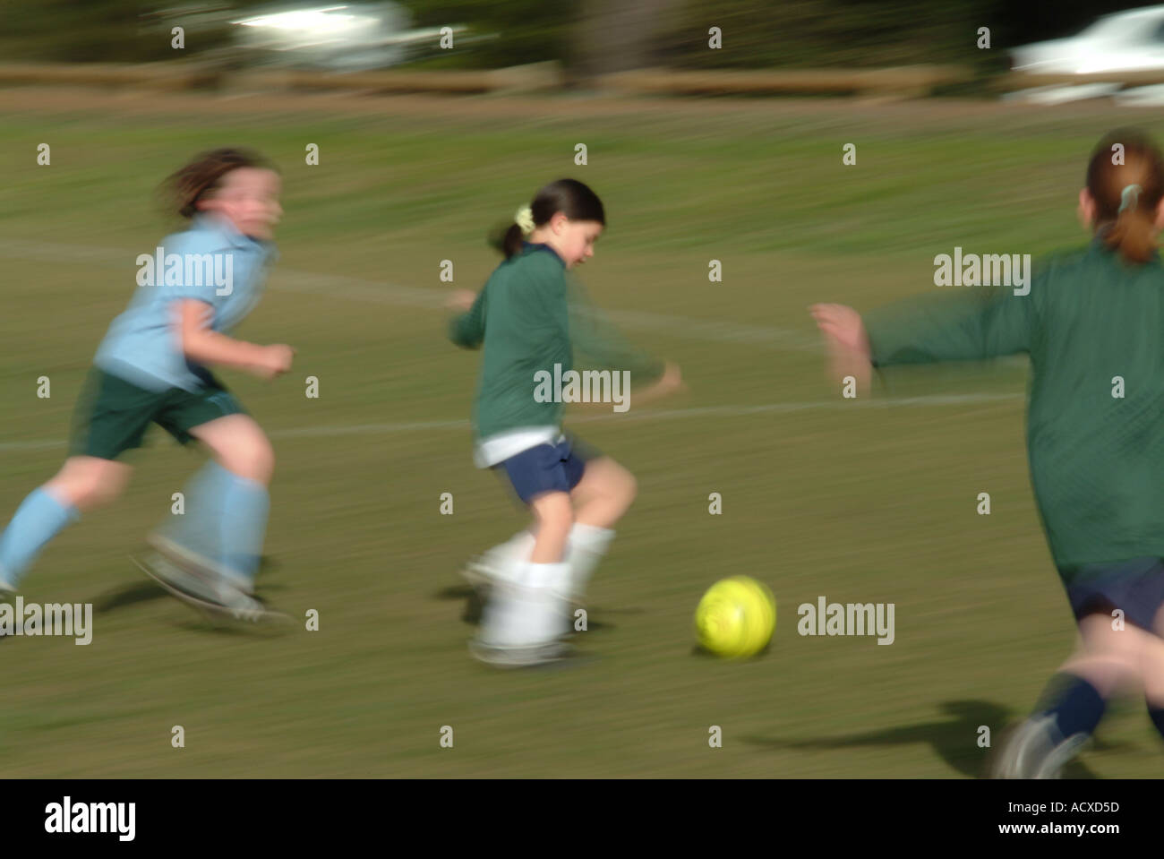 Girls playing soccer Stock Photo Alamy