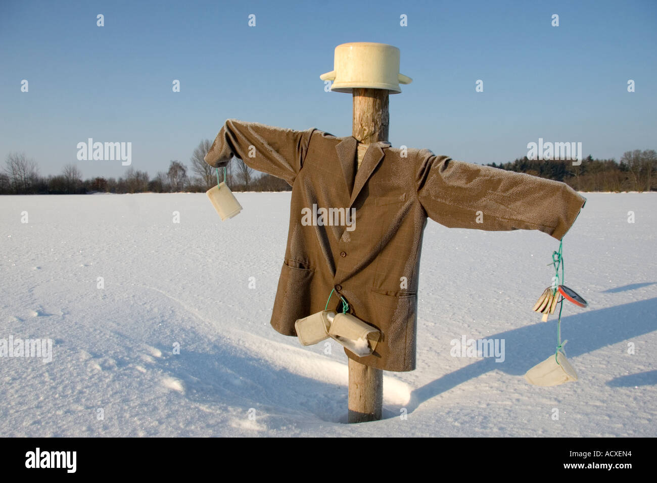 Scarecrow in snow Stock Photo