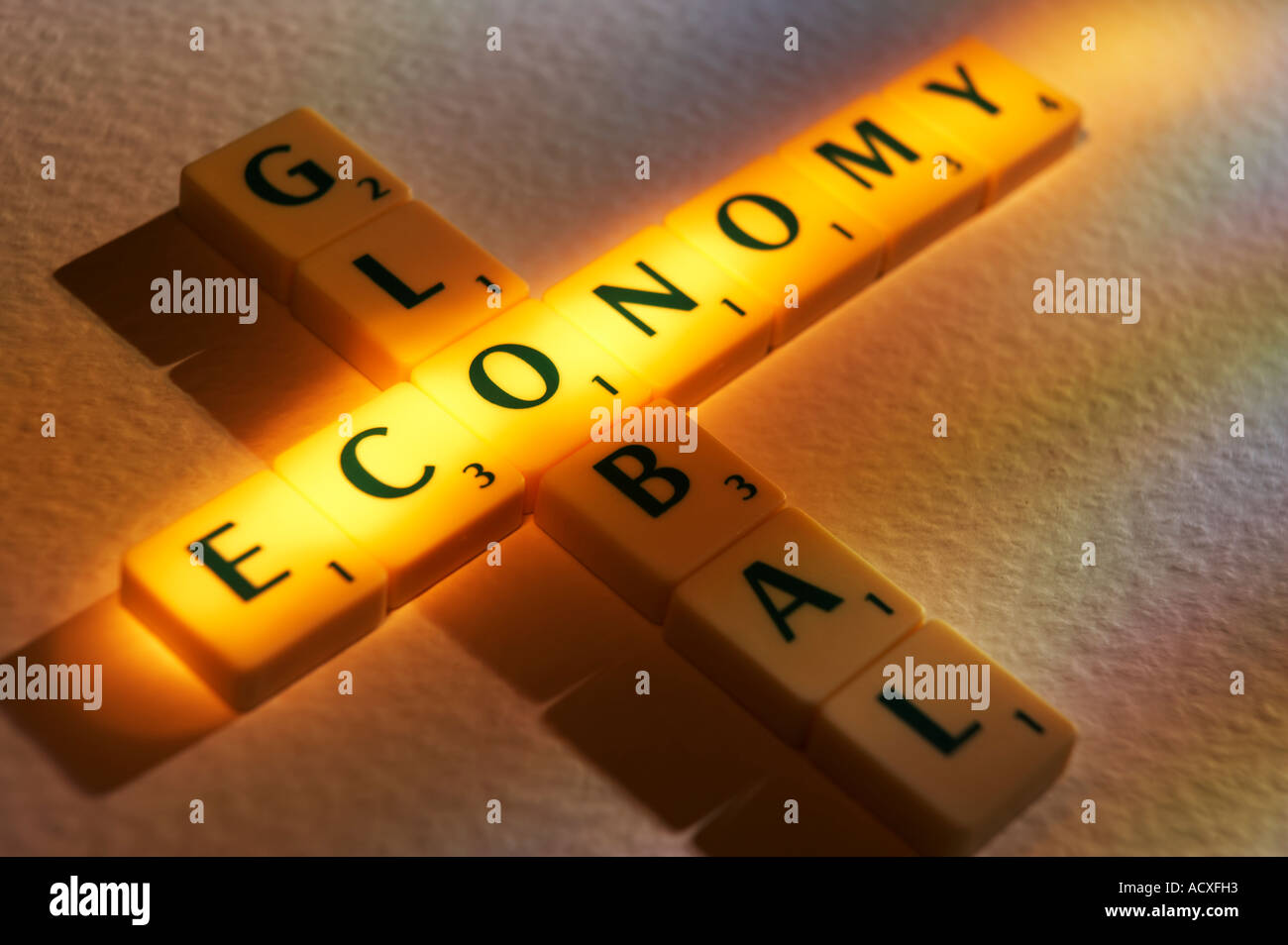 SCRABBLE BOARD GAME LETTERS SPELLING THE WORDS GLOBAL ECONOMY Stock Photo